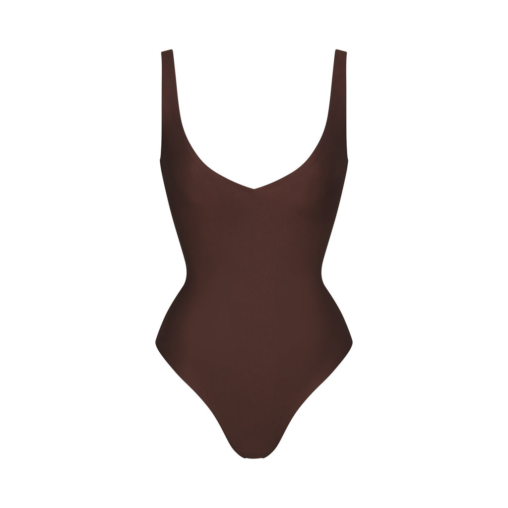 SKIMS BODY UNLINED PLUNGE THONG BODYSUIT | COCOA