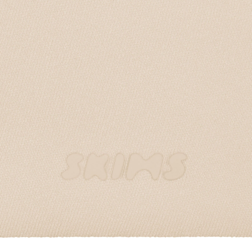 SKIMS ULTIMATE BODY PUSH-UP THONG BODYSUIT | SAND